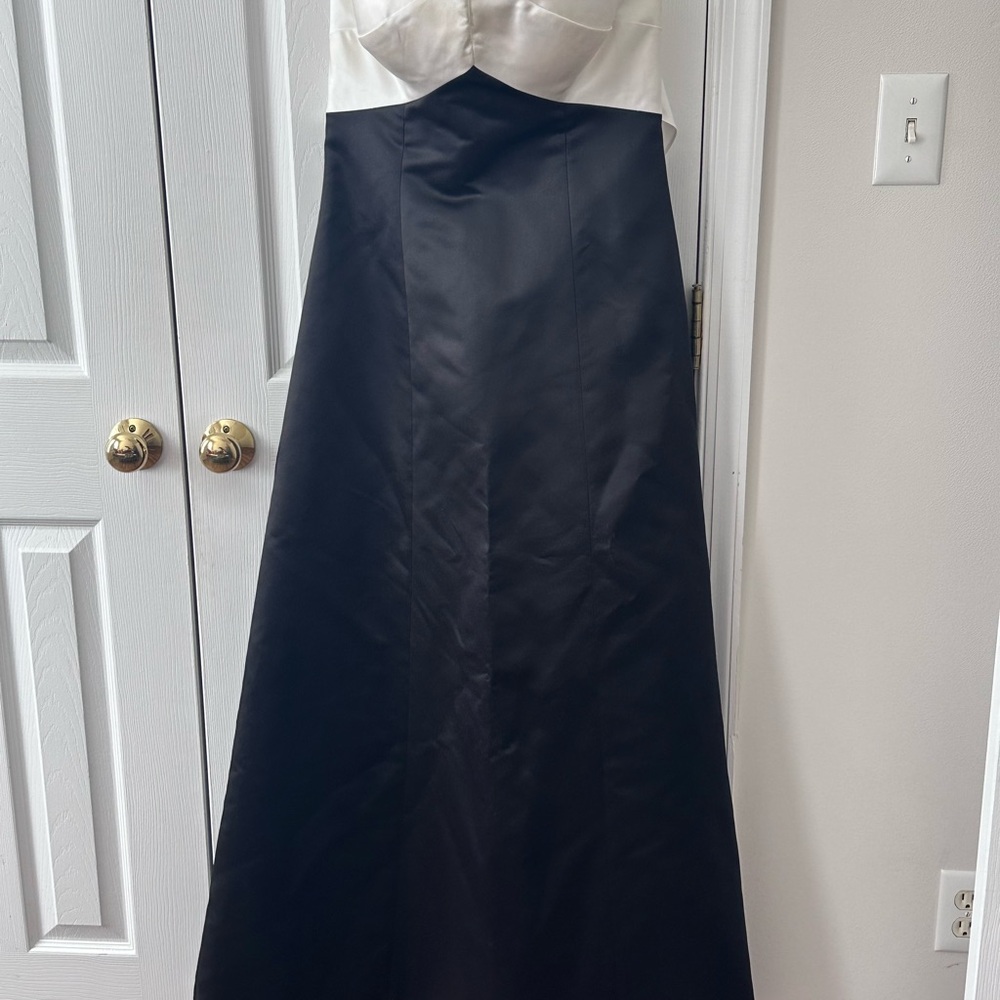 Camille La Vie Cream and Black Dress